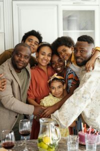 A sincere family unity gathering in a cozy kitchen, celebrating with joy and love.